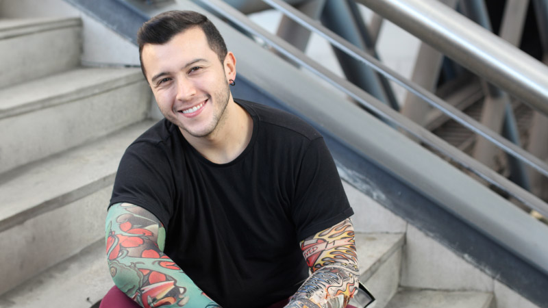 Good looking young man with tattoos.